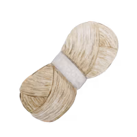 a white and brown hair bow on a black background